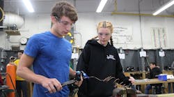 Apprentices in training. Apprentices in training.