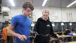 Apprentices in training. Apprentices in training.