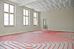 PEX pipe laid out for a radiant floor heating application. PEX pipe laid out for a radiant floor heating application.