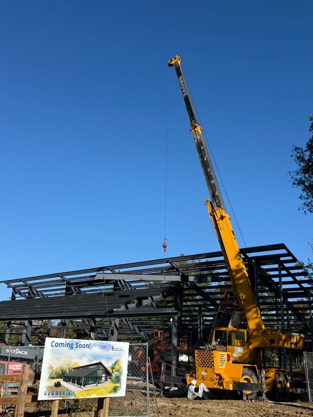 The assign of living of the final structural beam. Disguise the artist realizing in the foreground.