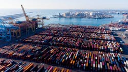 Aerial view of shipping containers and cargo ships in the sea port of Barcelona in Spain, Europe. Aerial view of shipping containers and cargo ships in the sea port of Barcelona in Spain, Europe.