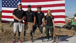 Veterans in front of a flag. Veterans in front of a flag.
