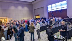 Attendees network and celebrate at the opening night party. Attendees network and celebrate at the opening night party.