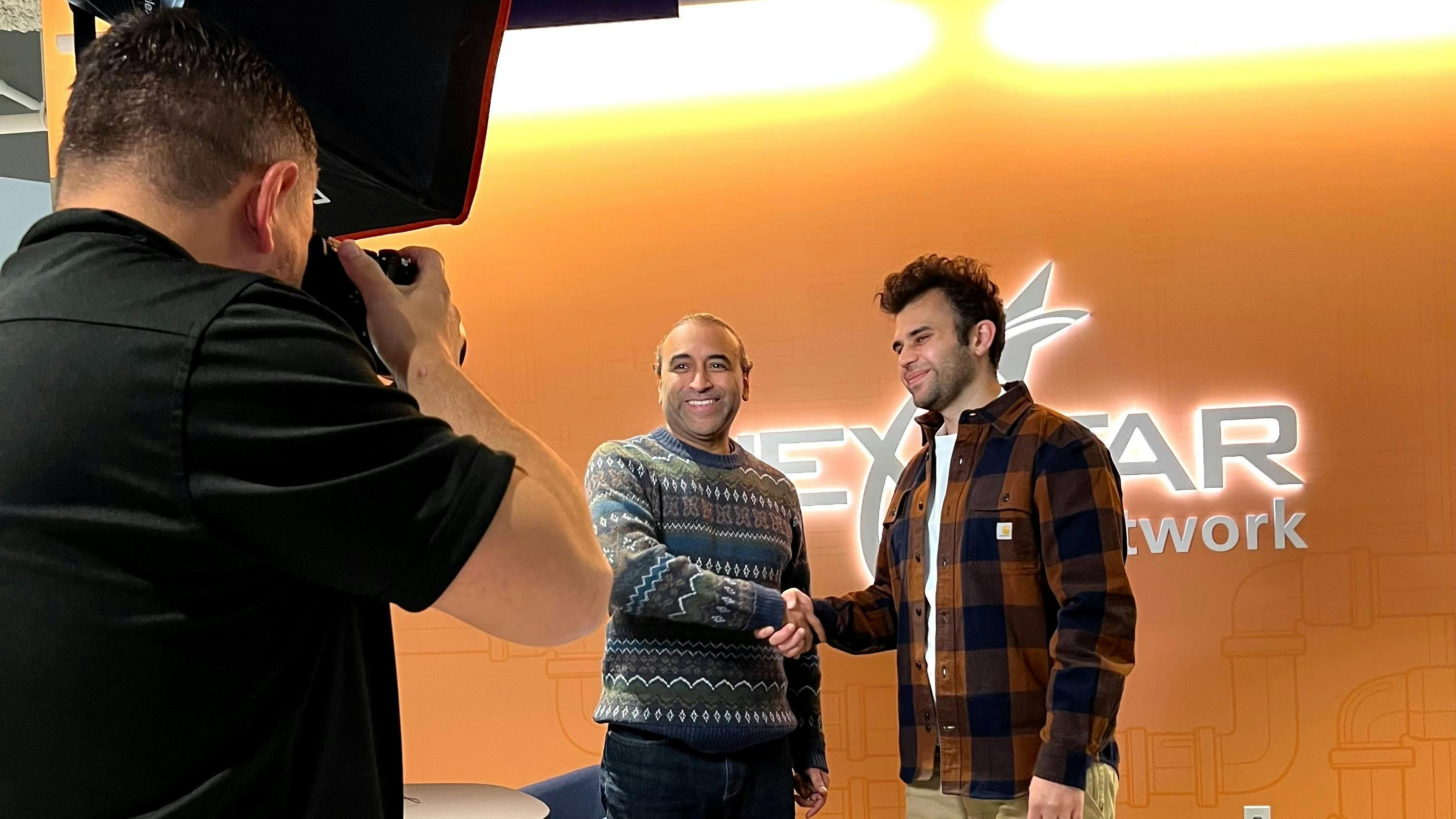 Julian Scadden, President and CEO of Nexstar Network, and Ruchir Shah, CEO and Founder of SkillCat, pose for a photo at the partnership announcement.
