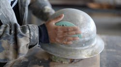 A vintage hard hat about to be transformed into a working lamp by Bo Shepherd of Woodward Throwbacks. A vintage hard hat about to be transformed into a working lamp by Bo Shepherd of Woodward Throwbacks.