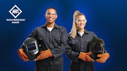 Young welding professionals. Young welding professionals.