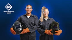 Young welding professionals. Young welding professionals.