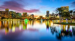 Orlando, Florida, USA downtown city skyline on Eola Lake. Orlando, Florida, USA downtown city skyline on Eola Lake.