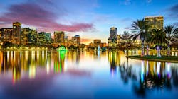 Orlando, Florida, USA downtown city skyline on Eola Lake. Orlando, Florida, USA downtown city skyline on Eola Lake.