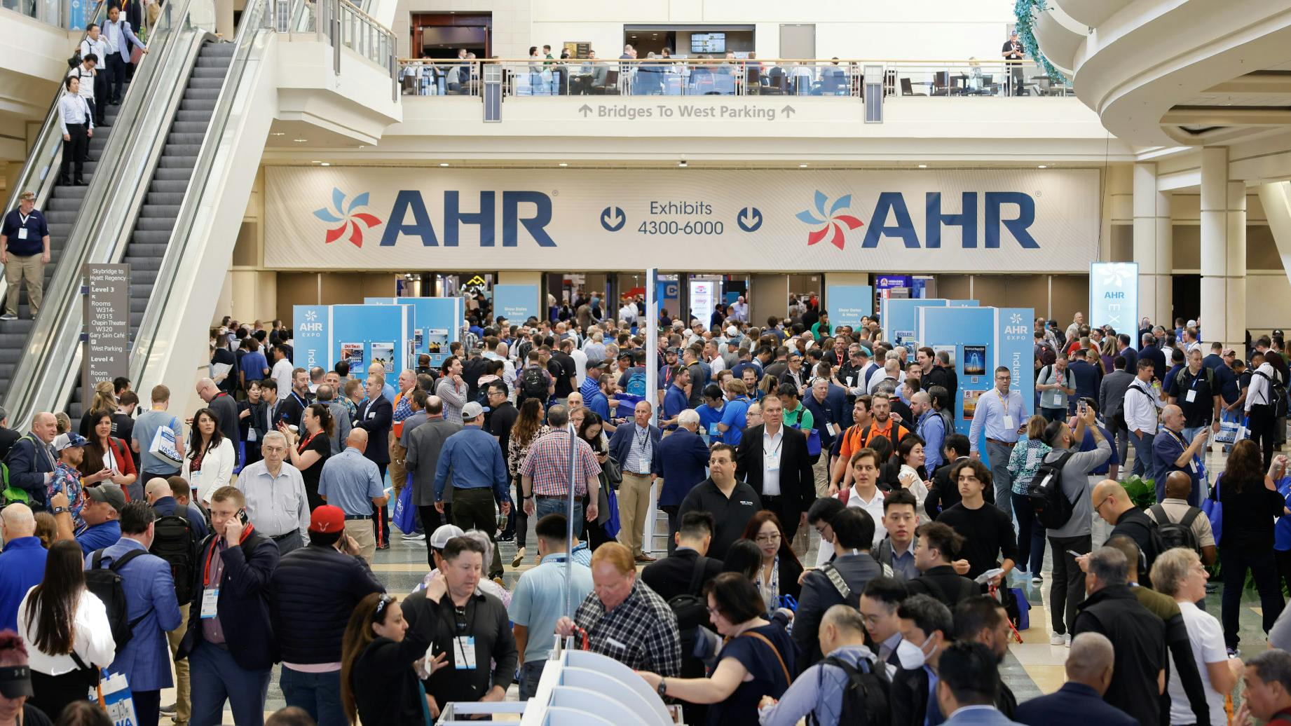Crowds at the entrance to the exhibit hall at AHR Expo 2025 in Orlando, FL.