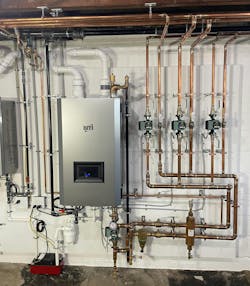 After: the new boiler from NTI operates at 95 percent efficiency and includes built-in zone control for up to three heating zones plus domestic hot water. After: the new boiler from NTI operates at 95 percent efficiency and includes built-in zone control for up to three heating zones plus domestic hot water.