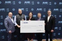 The Expo is also a time for giving back to the industry, as in this check presentation to the Central Technical Training Academy of Las Vegas. The Expo is also a time for giving back to the industry, as in this check presentation to the Central Technical Training Academy of Las Vegas.