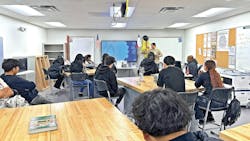 A classroom training session at the Dallas Independent School District. A classroom training session at the Dallas Independent School District.