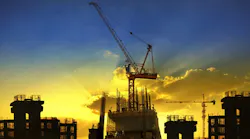 construction site against dramatic dusky sky construction site against dramatic dusky sky