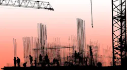 The silhouettes of construction workers, construction equipment and elements of a building The silhouettes of construction workers, construction equipment and elements of a building