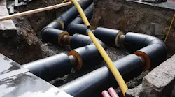 Water supply pipes in a trench. Water supply pipes in a trench.