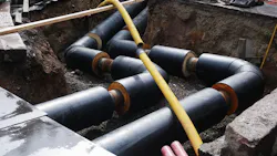 Water supply pipes in a trench. Water supply pipes in a trench.