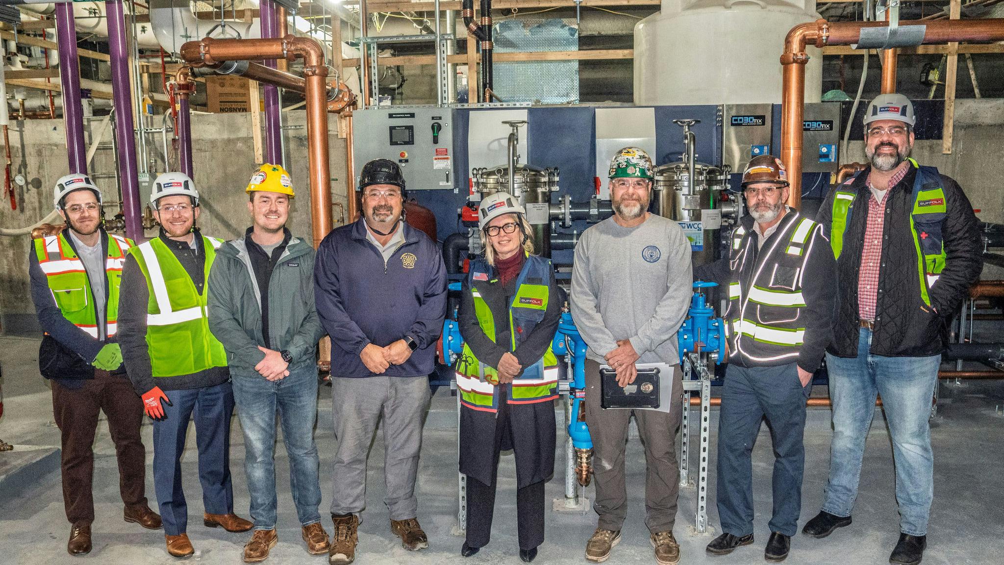 (L to R) State Senator DiDomenico's Director of Communications & Environmental Policy, Eli Fenichel; Executive Director of Climate Jobs MA, Ryan Murphy; GBPCA Executive Director Andrew DeAngelo; Local 12 Business Agent, Frank Amato; State Rep. Marjorie Decker; Foreman JC Higgins, Chris Mohan; Local 12 Business Agent Chad Carbone; State Rep. Mike Conolly.