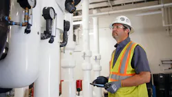 A Harris tech performing an inspection. A Harris tech performing an inspection.