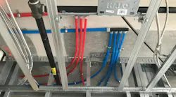 Uponor AquaPEX pipe and ProPEX multiport tee. Uponor AquaPEX pipe and ProPEX multiport tee.