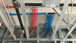 Uponor AquaPEX pipe and ProPEX multiport tee. Uponor AquaPEX pipe and ProPEX multiport tee.