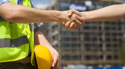 shaking hands at the construction site shaking hands at the construction site