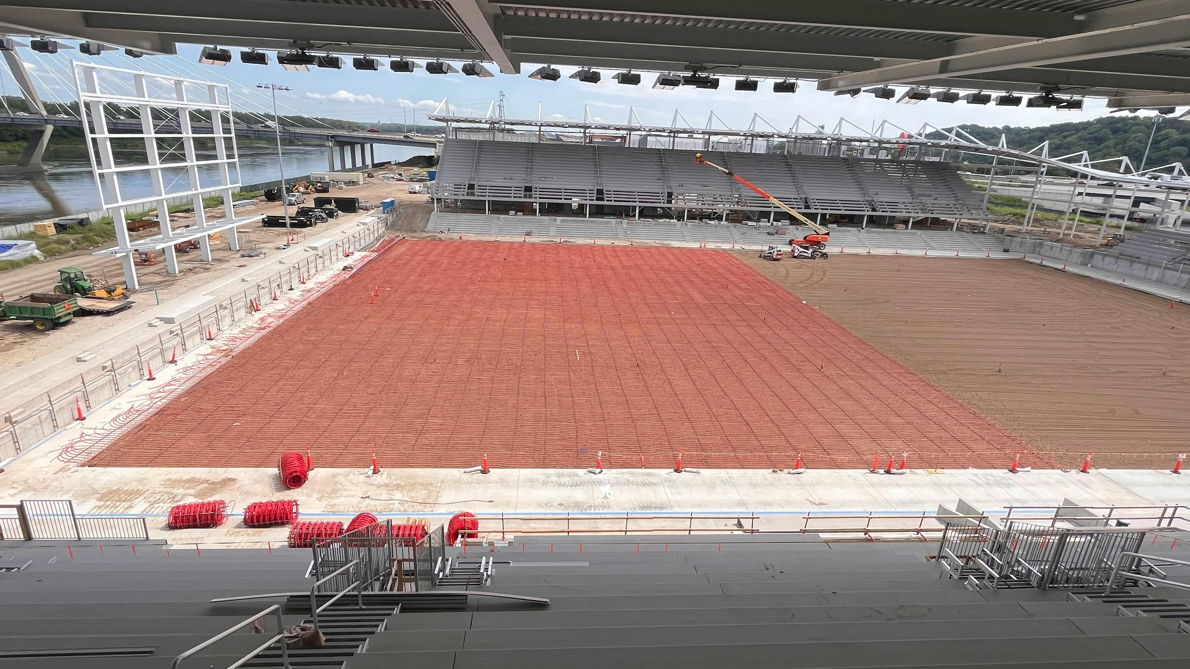 Radiant tubing mid-installation, as seen from the stands of the new stadium.