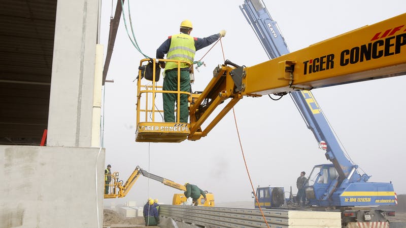 Workers on construction site.
