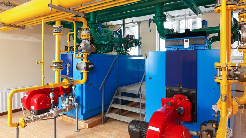 Industrial boilers, pipes and pumps.