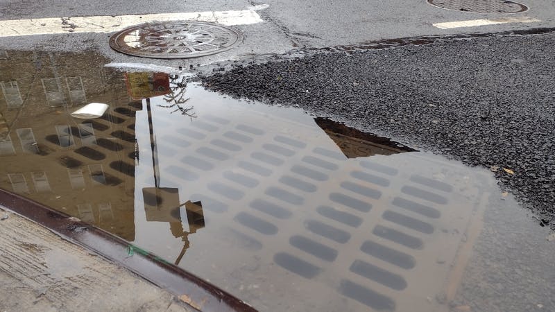 overflowing sewer drain