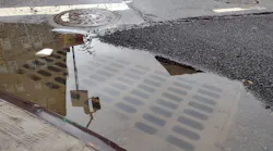 overflowing sewer drain