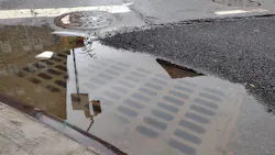 overflowing sewer drain overflowing sewer drain