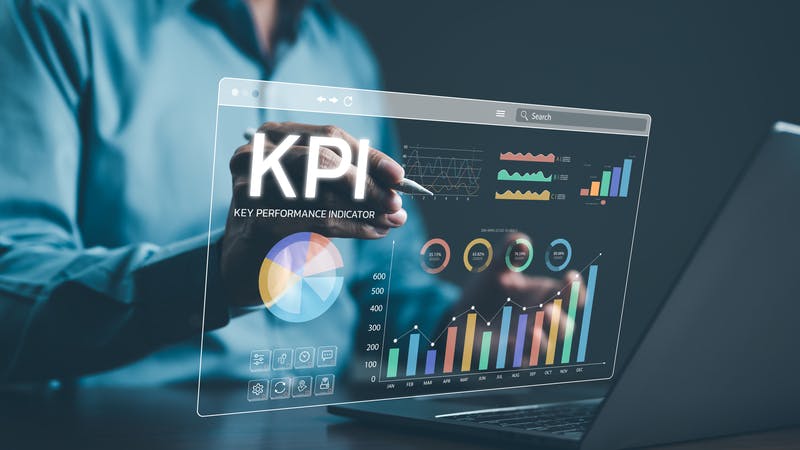 businessman examining KPIs