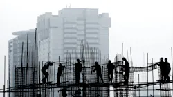 construction workers on the job site. construction workers on the job site.