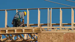 Construction worker with nail gun Construction worker with nail gun