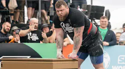 A compeititor rests on a KNAACK MONSTERBOX during the World's Strongest Man competition.