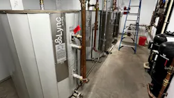 The 300-gal. storage tanke (foreground) in the mechanical room.