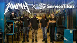 skilled workers posing in a training setting