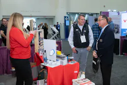 Attendees speak wth product experts at the Technology Showcase.