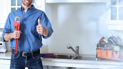positive plumber giving thumbs-up