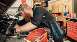 technician servicing a van