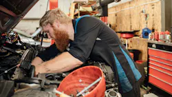 technician servicing a van
