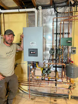 Steve Fernandez with the completed hydronic system.