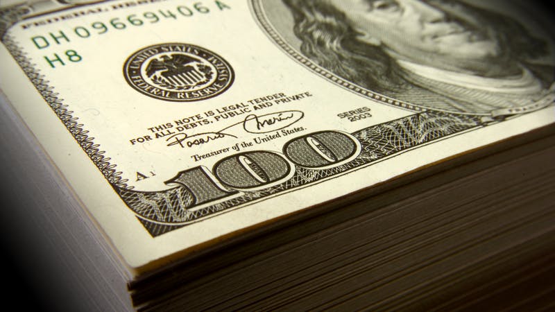 stack of 100 dollar bills
