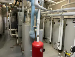 The building had existing domestic water storage tanks, that the Veritus heat pump feeds to supply DHW.