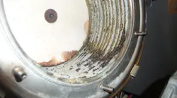 Scale present in the heat exchanger.