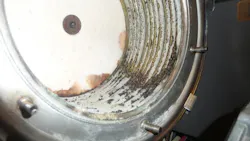 Scale present in the heat exchanger.