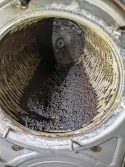 A LOT of scale in the heat exchanger.