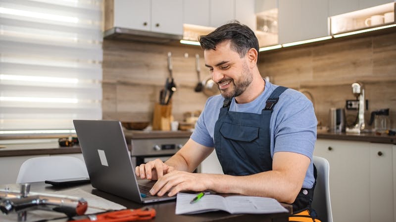 happy plumber sharing educational content