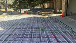Driveway radiant snowmelt installation in progress.